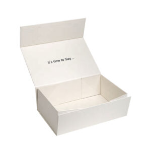 Open ivory collapsible wig gift box with hinged lid and printed interior message